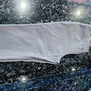 Grey Chico’s ankle pants.